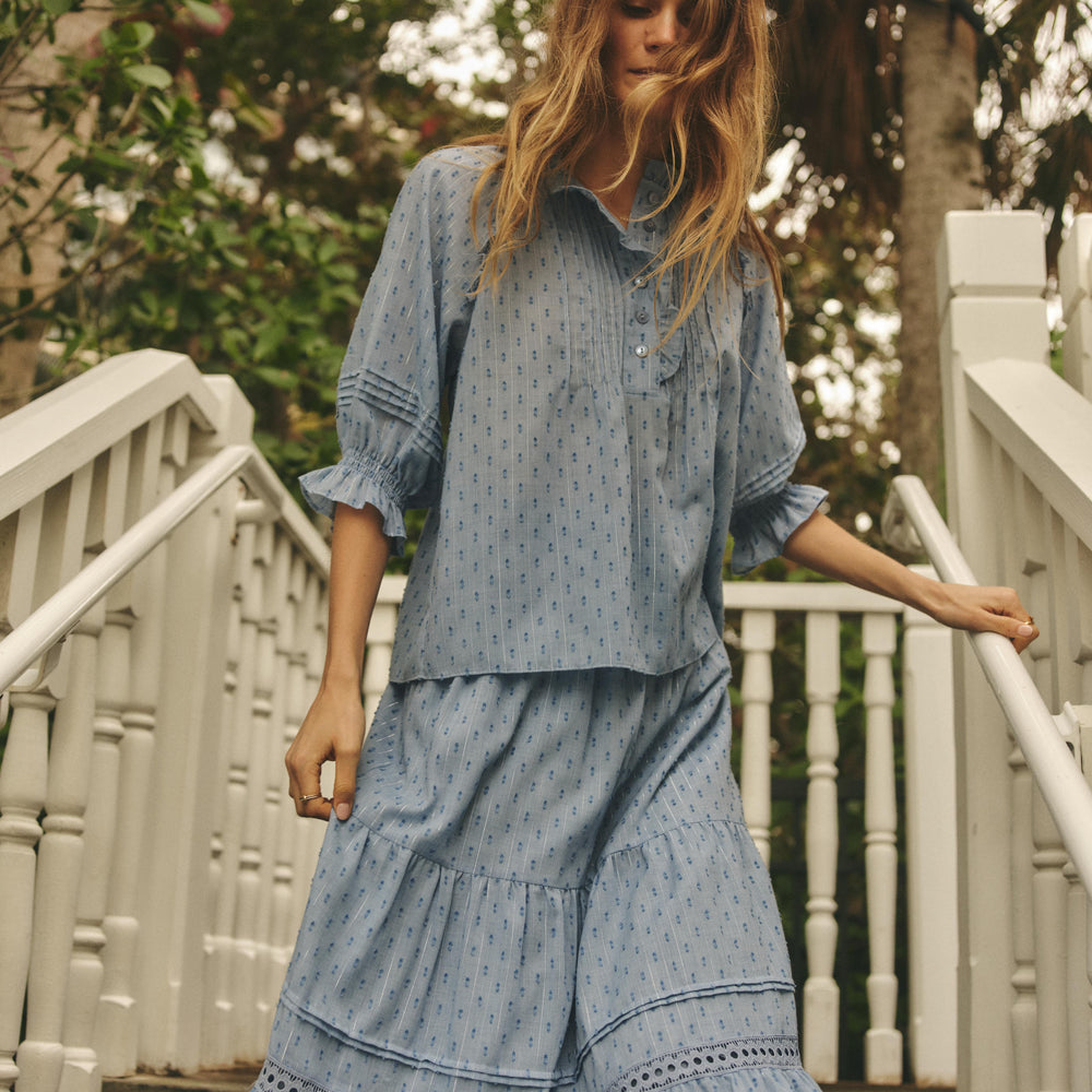 Woman Wearing Afina Top In Mediterranean Blue